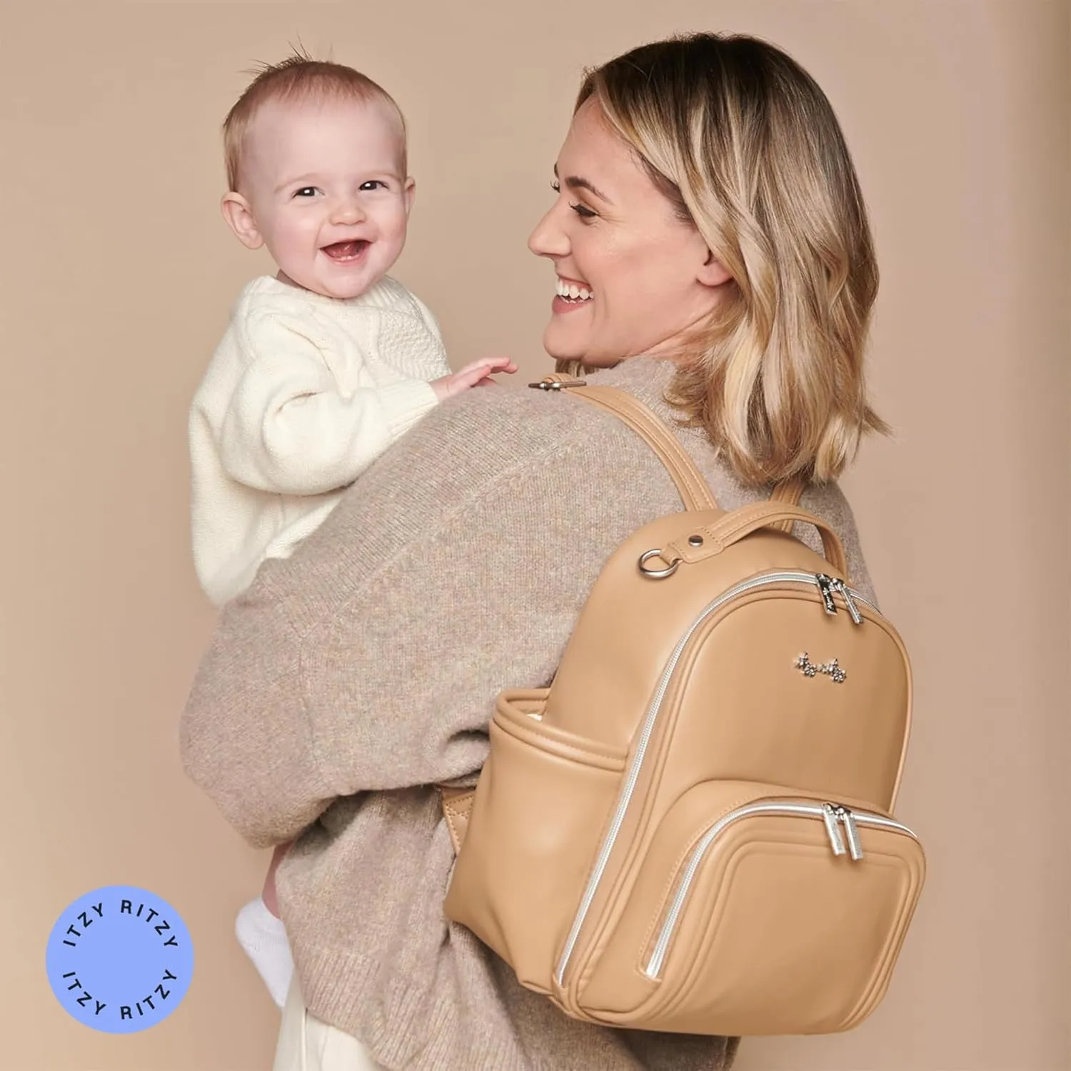 Itzy Ritzy Mini Diaper Bag Backpack – Chic, Compact Mini Plus Backpack with Changing Pad, 10 Pockets (6 Internal, 4 External), Grab-Top Handle & Rubber Feet (Chai)