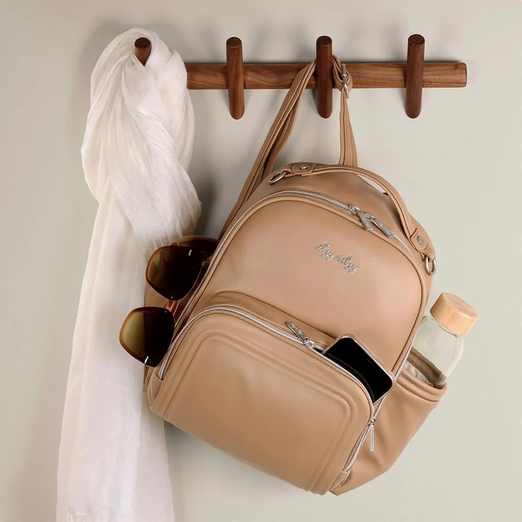 Itzy Ritzy Mini Diaper Bag Backpack – Chic, Compact Mini Plus Backpack with Changing Pad, 10 Pockets (6 Internal, 4 External), Grab-Top Handle & Rubber Feet (Chai)