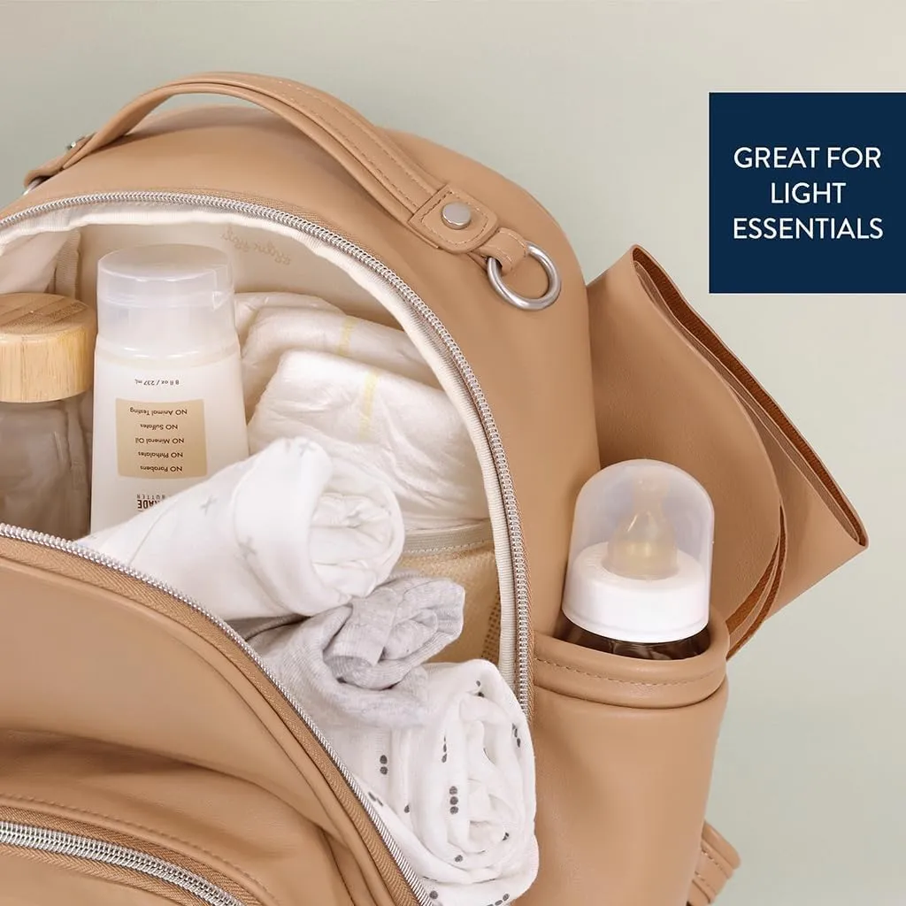 Itzy Ritzy Mini Diaper Bag Backpack – Chic, Compact Mini Plus Backpack with Changing Pad, 10 Pockets (6 Internal, 4 External), Grab-Top Handle & Rubber Feet (Chai)